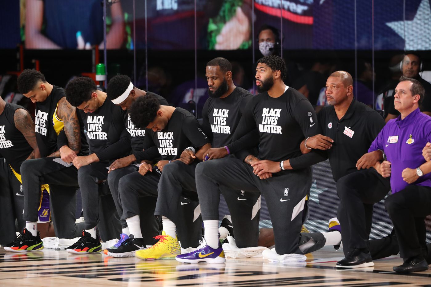 NBA players and coaches kneel during national anthem as season ...
