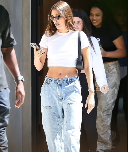 Hailey Bieber and Justin: After marrying Justin, Hailey Bieber sported an elegantly trimmed midriff in a crop top and blue jeans.
